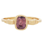 Front view of 18k yellow gold ring with a shape inspired  by the greek hydria and central rectangle shaped rose sapphire.         