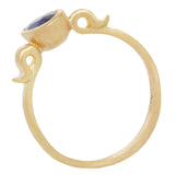 Side view of 18k yellow gold ring with a shape inspired  by the greek hydria and central teardrop shaped purple and navy sapphire canted at an angle.         