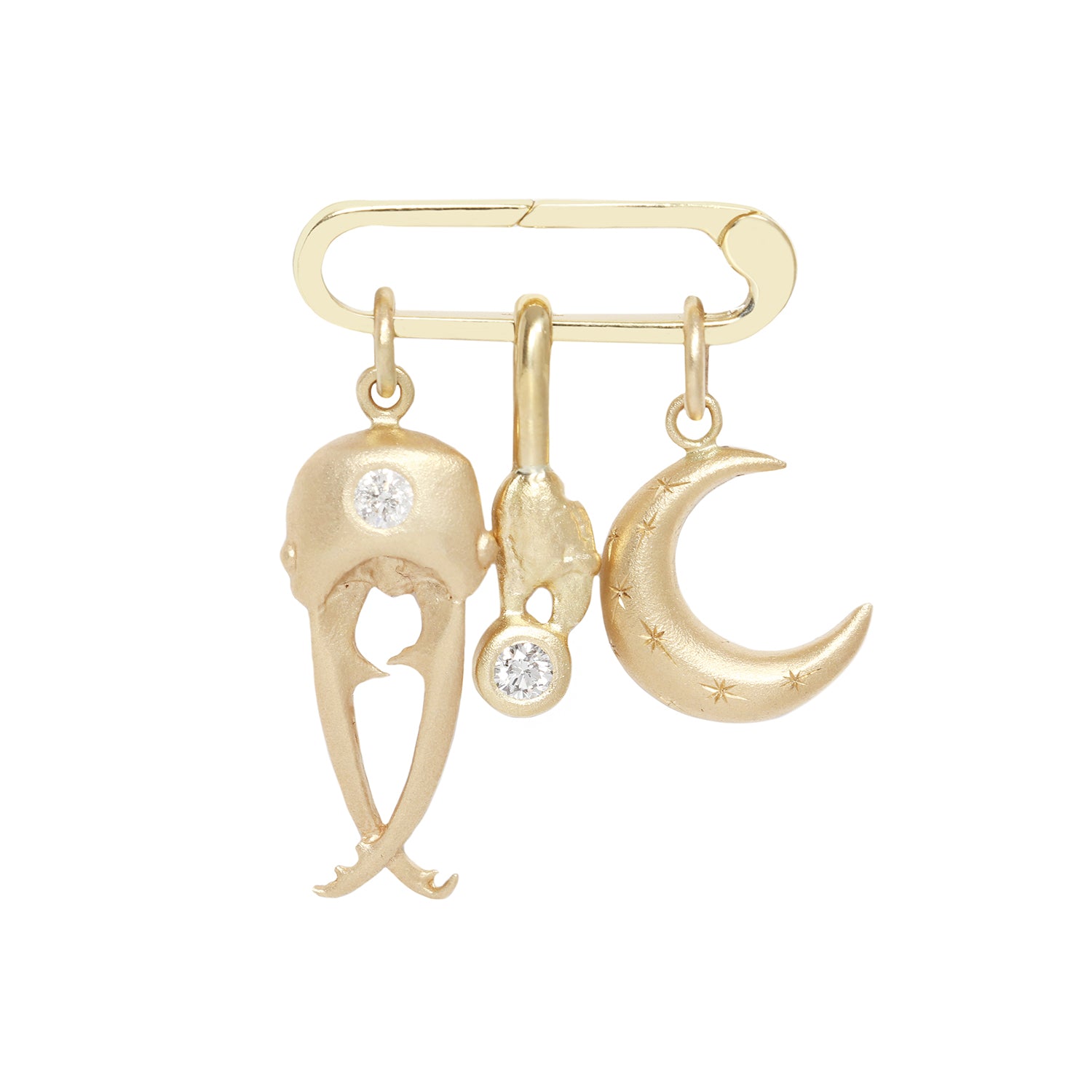 View of large 14k yellow gold charm holder with three charms dangling from it.  A beetle head, carb claw, and crescent moon.