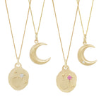 Top row is two engraved crescent moon pendants, bottom row is two night sky pendants, including the diamond version available here.  Each is hanging from its own chain.