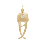 Gold beetle head pendant with diamond set in center of head